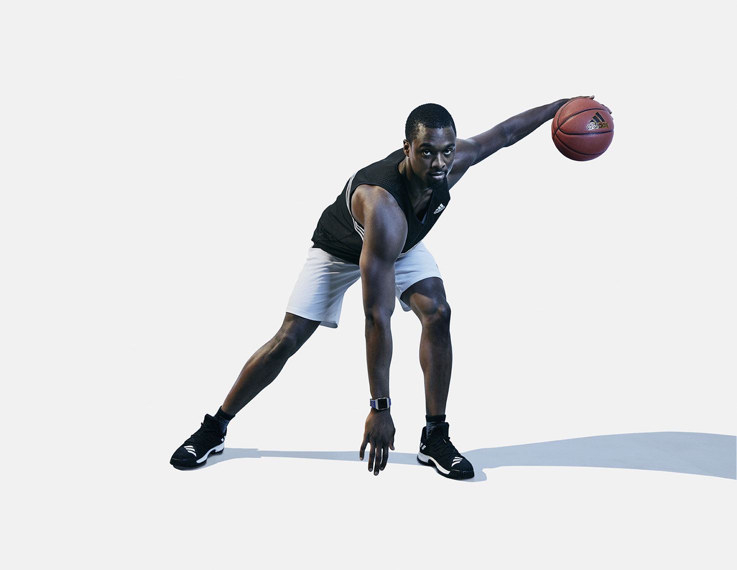 RC RIVERA shoots NBA player Harrison Barnes for Fitbit and Adidas. 